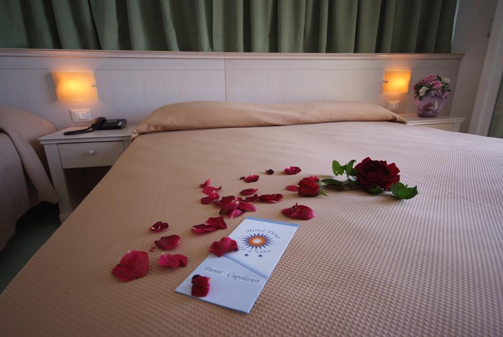 Hotel Dino Каполивери Екстериор снимка